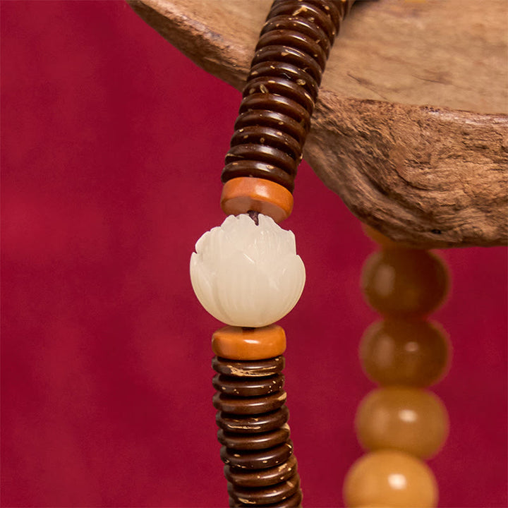 Bransoletka mądrości z tybetańskich Buddha Stones z nasionami bodhi i koralikami Dzi z łupin kokosa
