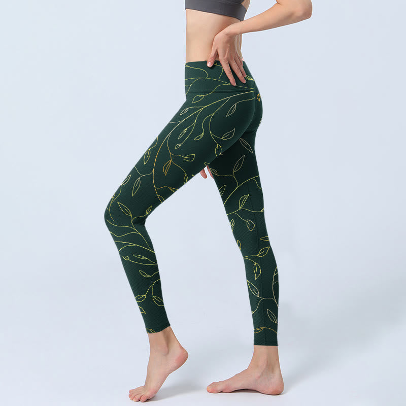 Legginsy do jogi damskie z nadrukiem "Buddha Stones" w zielone złote liście i gałęzie - image 3