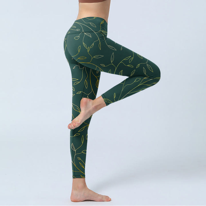 Legginsy do jogi damskie z nadrukiem "Buddha Stones" w zielone złote liście i gałęzie - image 3