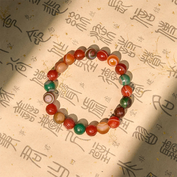 Bransoletka z naturalnego agatu Alashan z Buddha Stones dodająca pewności siebie