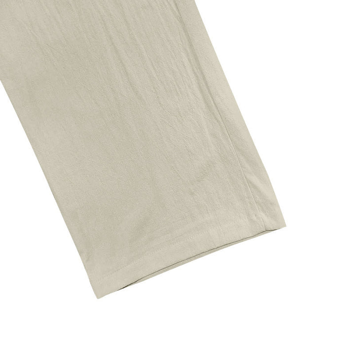 Spodnie męskie bawełniane z kieszeniami i guzikami w jednolitym kolorze z motywem Buddha Stones - image 22