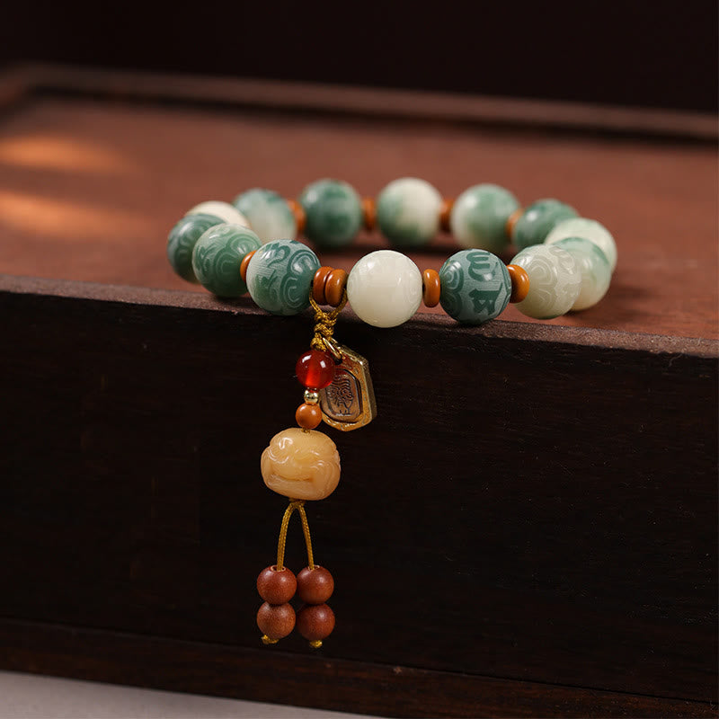 Bransoletka z Buddha Stones z nasionem Bodhi, rzeźbionym zakiramem i kamieniami Om Mani Padme Hum - Nasiona Bodhi i Zakiram (obwód nadgarstka: 15-16 cm) - image 1