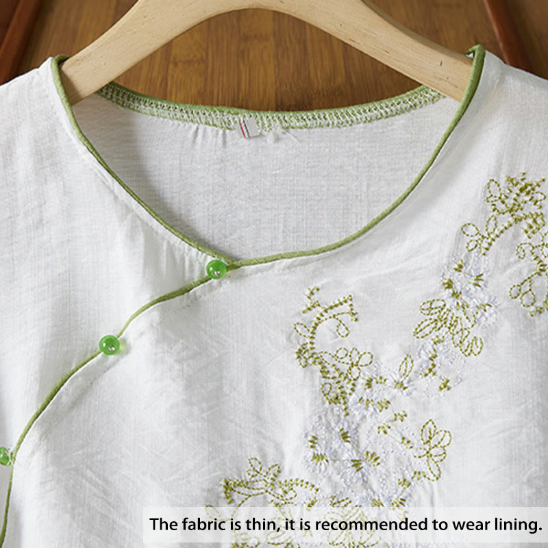 Koszula z bawełny lnianej z haftem w kwiaty w stylu casual dla kobiet zapinana na guziki żaby i kołnierzykiem skośnym - image 2