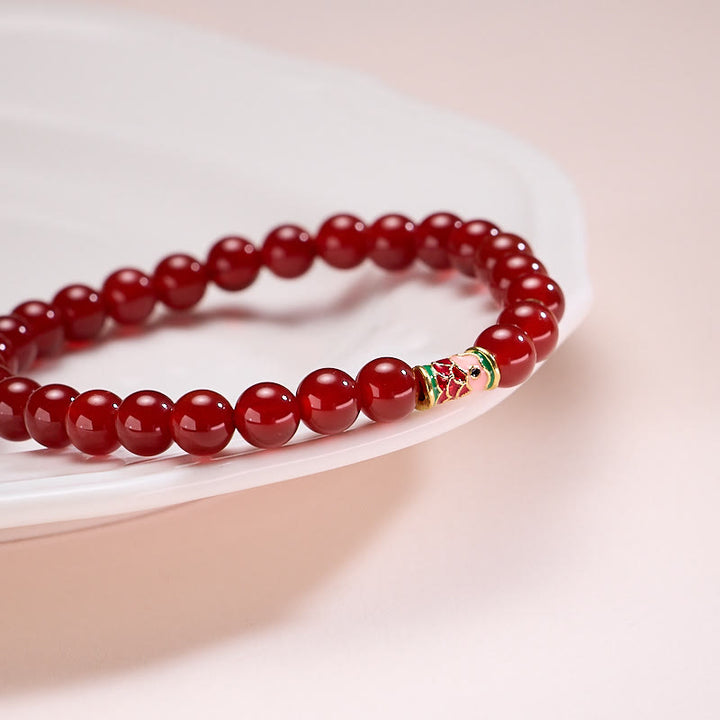 Bransoletka z naturalnego czerwonego agatu z Buddha Stones, dająca szczęście i pewność siebie w kształcie ryby Koi - image 2
