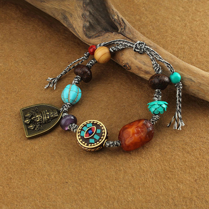 Bransoletka ochronna z liną Zakiram z turkusowym okiem Buddy i lotosem w kształcie Buddha Stones - image 3