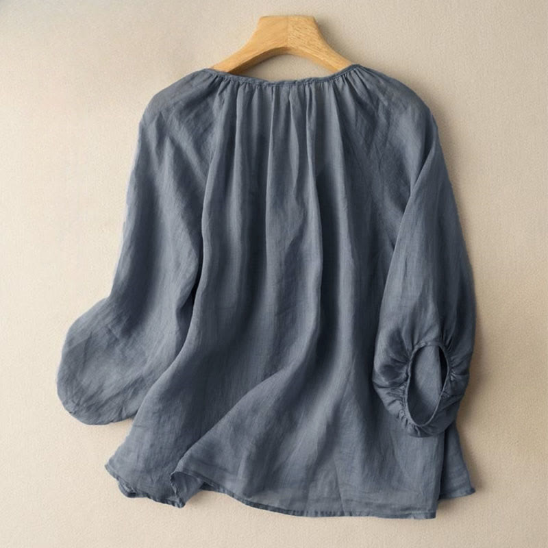 Koszula damska z bufiastymi rękawami i dekoltem w serek, zapinana na trzy czwarte, z motywem Buddha Stones - image 1