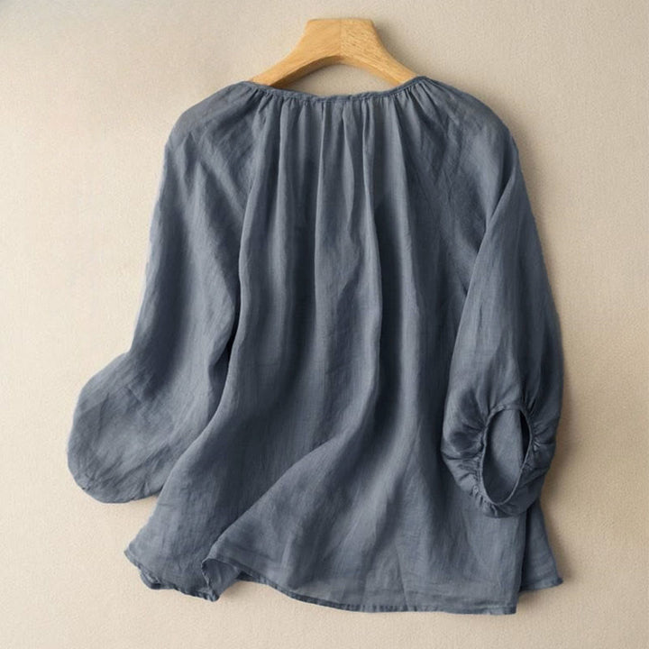 Koszula damska z bufiastymi rękawami i dekoltem w serek, zapinana na trzy czwarte, z motywem Buddha Stones - image 1