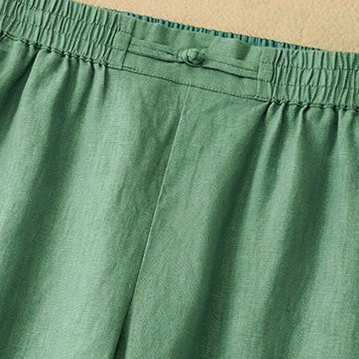 Damskie spodnie z szerokimi nogawkami i kieszeniami, bawełniane, z elastycznym pasem w jednolitym kolorze i guzikami w kształcie żaby, z Buddha Stones - image 1