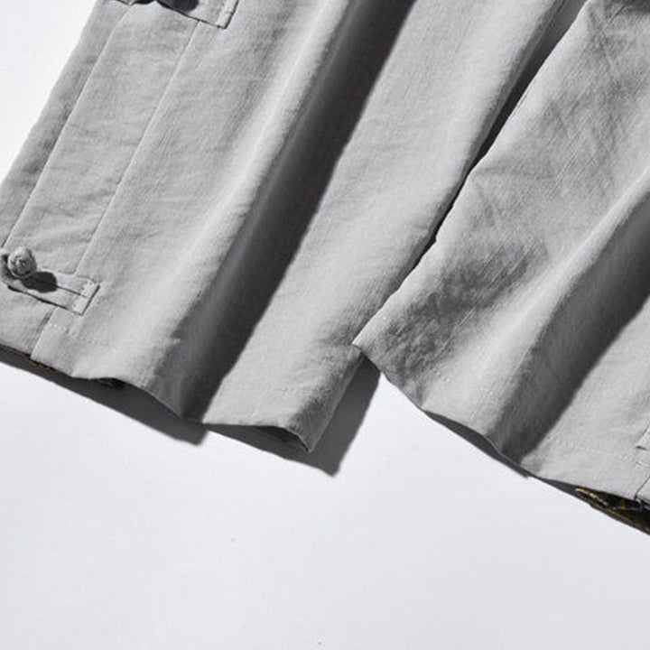 Spodnie męskie z szerokimi nogawkami i kieszeniami, w swobodnym stylu patchworkowym z motywem żurawia i żabich guzików z motywem Buddha Stones - image 29