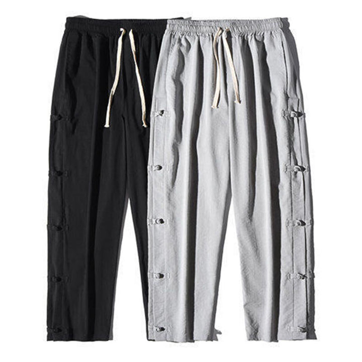 Spodnie męskie z szerokimi nogawkami i kieszeniami, w swobodnym stylu patchworkowym z motywem żurawia i żabich guzików z motywem Buddha Stones - image 30