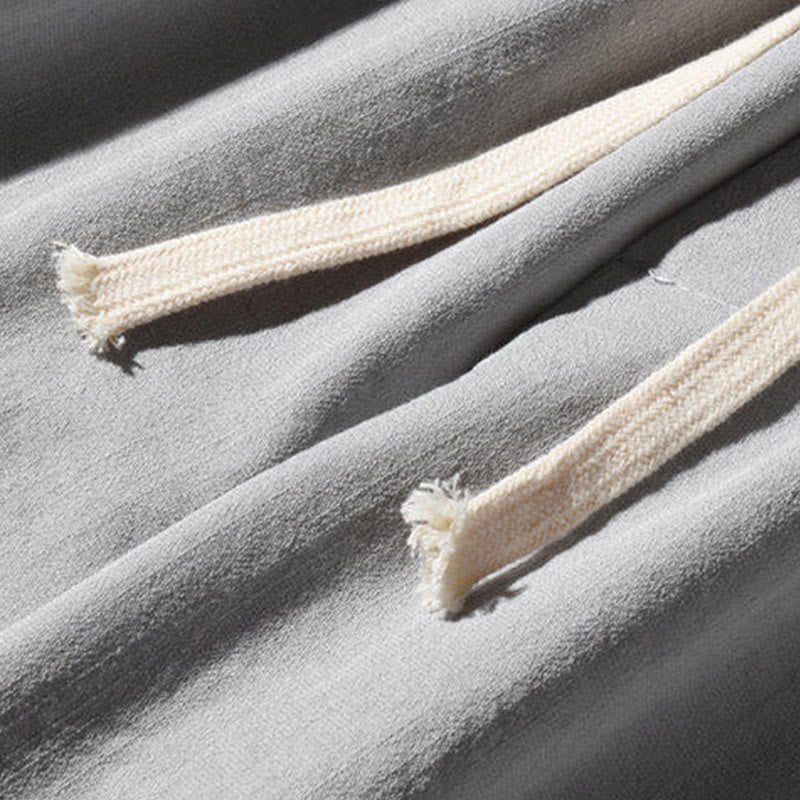 Spodnie męskie z szerokimi nogawkami i kieszeniami, w swobodnym stylu patchworkowym z motywem żurawia i żabich guzików z motywem Buddha Stones - image 24