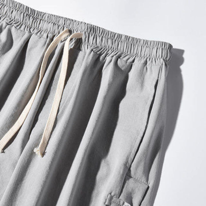 Spodnie męskie z szerokimi nogawkami i kieszeniami, w swobodnym stylu patchworkowym z motywem żurawia i żabich guzików z motywem Buddha Stones - image 22