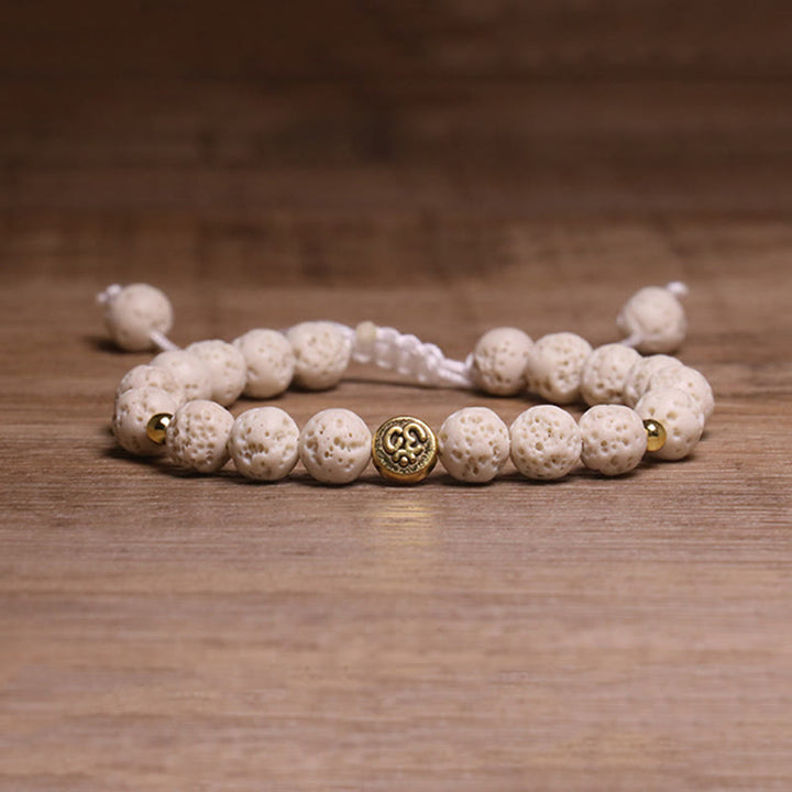 Bransoletka z Buddha Stones i symbolem Om, uzdrawiająca i uspokajająca - Biała skała lawowa (obwód nadgarstka: 15-21 cm) - image 1