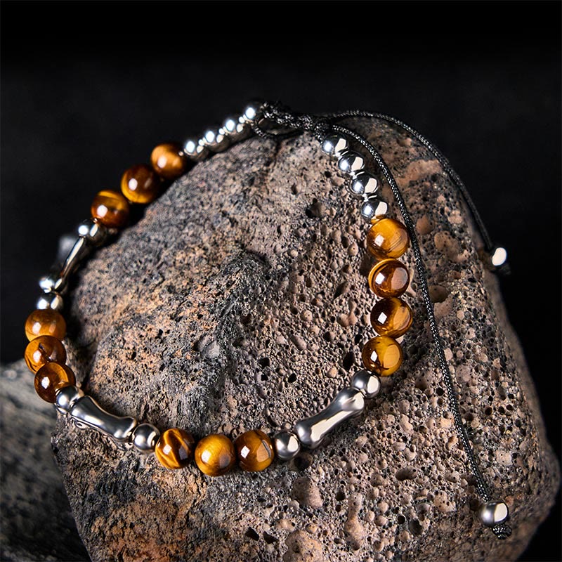 Bransoletka z Buddha Stones z uroczym wzorem kości i tygrysim okiem - Tygrysie oko i stal tytanowa (obwód nadgarstka: 15-21 cm) - image 1
