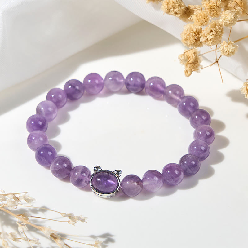 Bransoletka lecznicza z naturalnym ametystem i Buddha Stones w kształcie uroczego kota - image 2