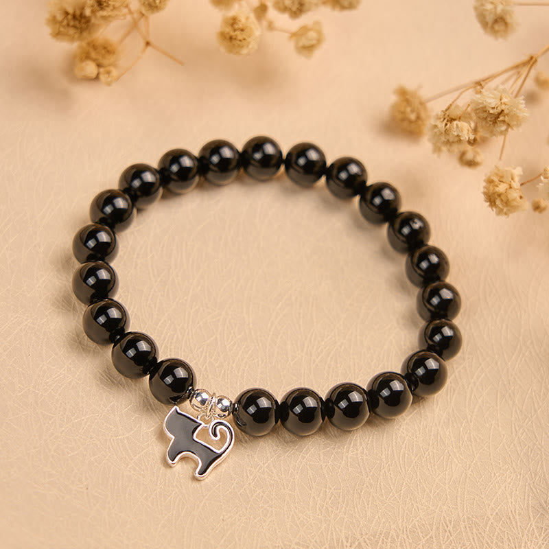 Bransoletka ochronna z naturalnego czarnego onyksu z zawieszką w kształcie kociaka ze srebra próby 925 i Buddha Stones - image 2