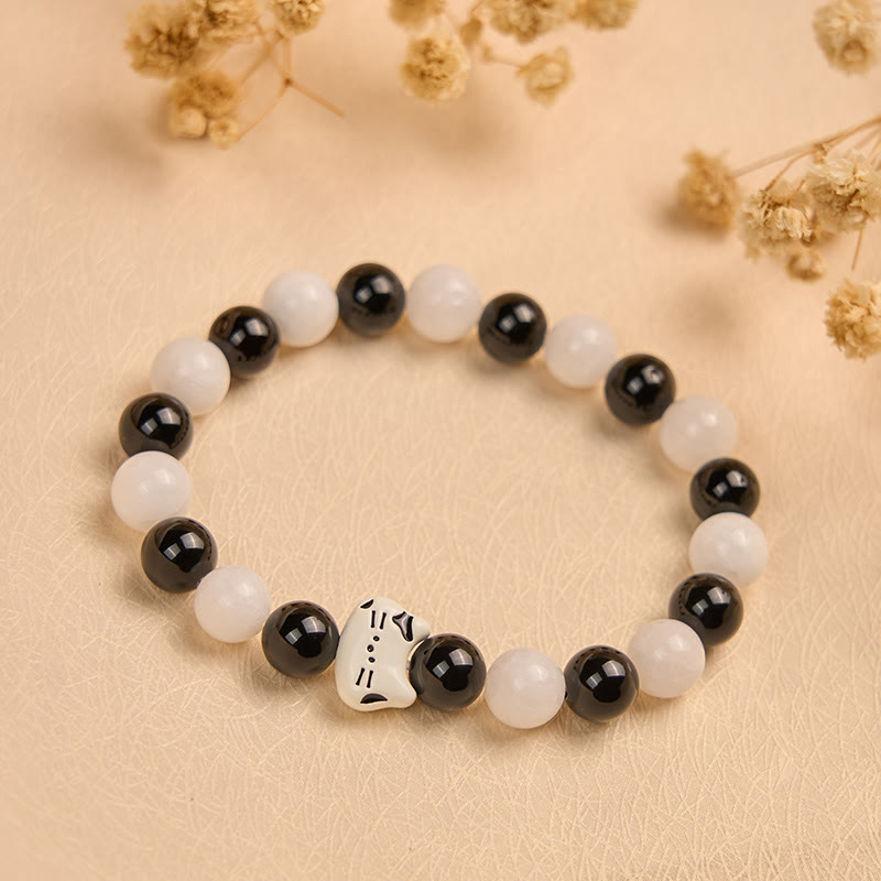 Bransoletka z Buddha Stones , dwukolorowy kot, czarny onyks, biały chalcedon, przynosząca szczęście - image 2
