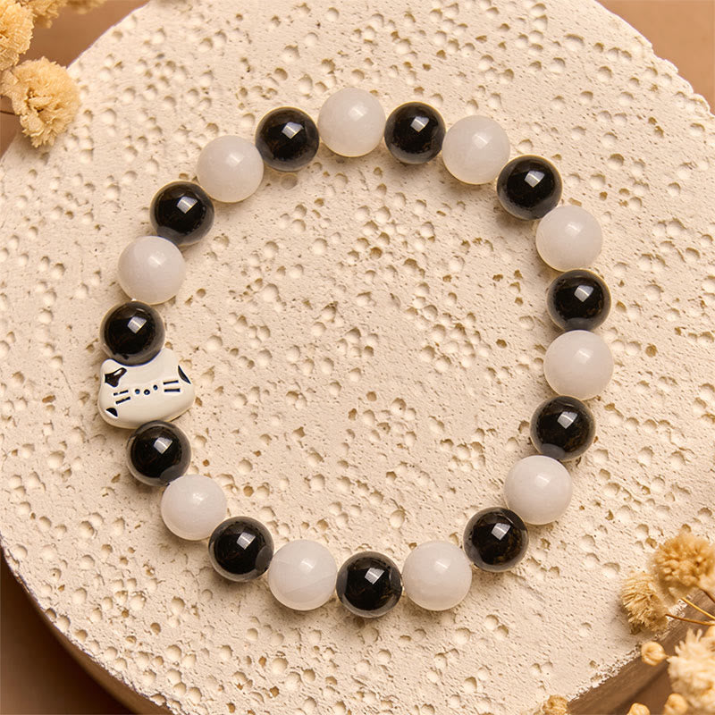 Bransoletka z Buddha Stones , dwukolorowy kot, czarny onyks, biały chalcedon, przynosząca szczęście - image 2