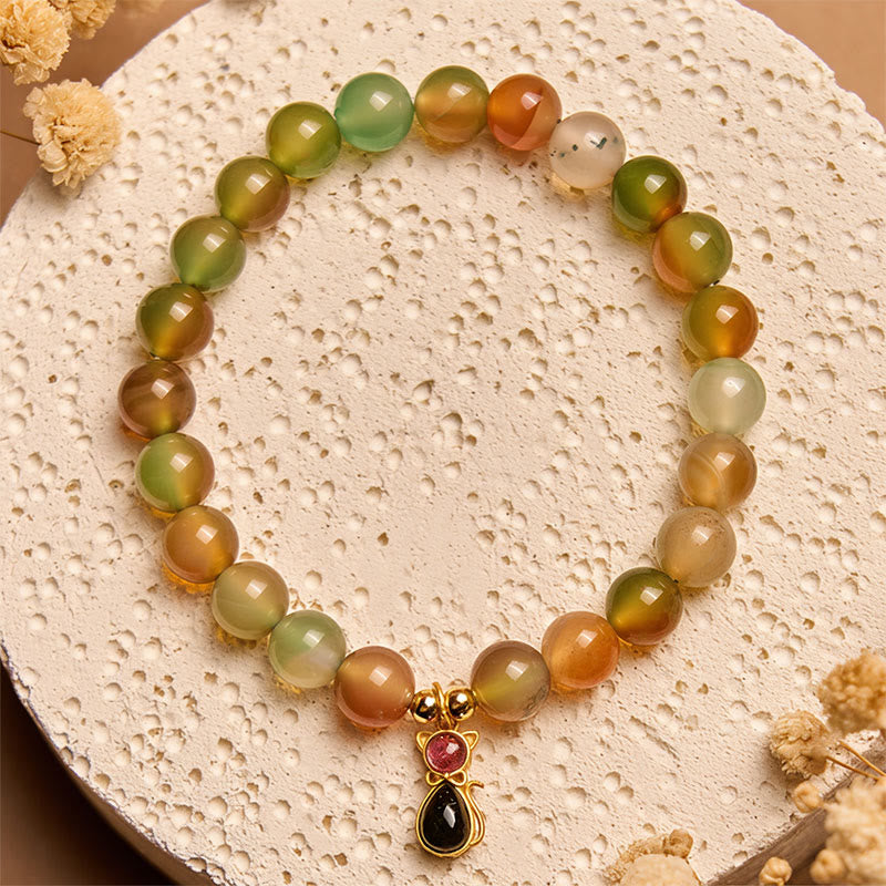 Bransoletka z Buddha Stones ze srebra próby 925, turmalinu i naturalnego pawia z agatu - Agat pawi (obwód nadgarstka 15-16 cm) - image 1