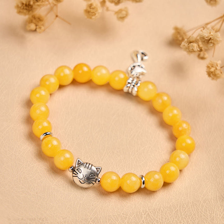 Bransoletka z Buddha Stones z pomarańczowym pręgowanym kotem i żółtym chalcedonem - image 3