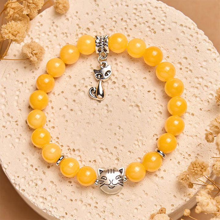 Bransoletka z Buddha Stones z pomarańczowym pręgowanym kotem i żółtym chalcedonem - image 2