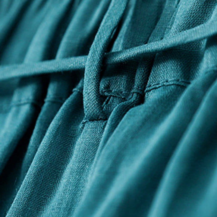 Spodnie damskie z szerokimi nogawkami i kieszeniami, proste, z bawełny, z nadrukiem "Buddha Stones", ze ściągaczem - image 4