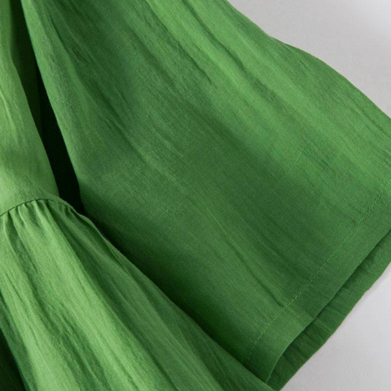 Letnia sukienka midi z bawełny z dekoltem w serek i krótkim rękawem "Buddha Stones" - image 11