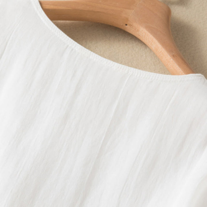 Letnia sukienka midi z bawełny z dekoltem w serek i krótkim rękawem "Buddha Stones" - image 35