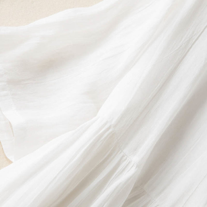 Letnia sukienka midi z bawełny z dekoltem w serek i krótkim rękawem "Buddha Stones" - image 19