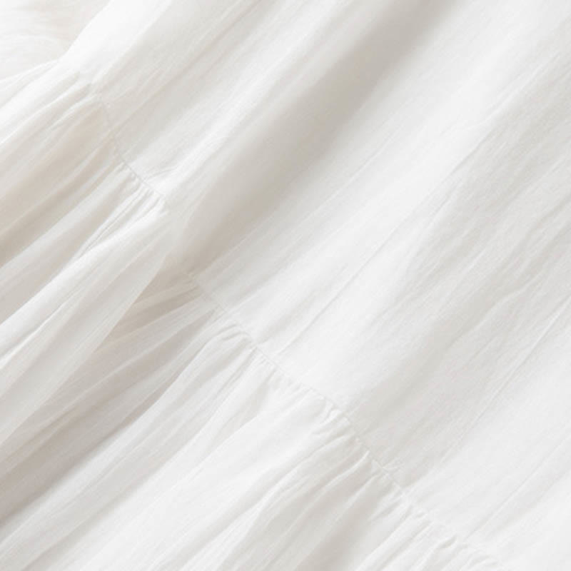 Letnia sukienka midi z bawełny z dekoltem w serek i krótkim rękawem "Buddha Stones" - image 21