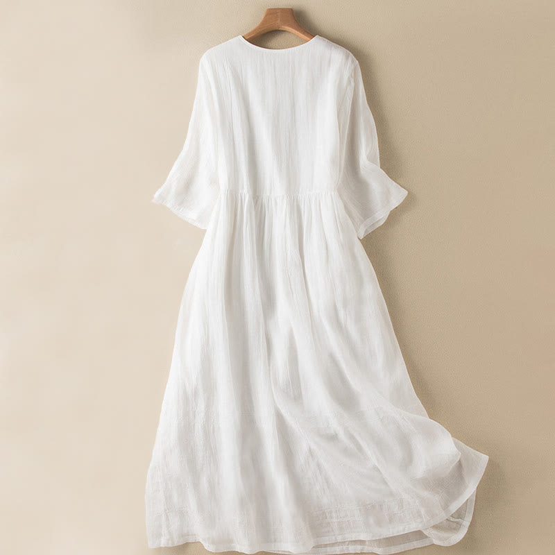 Letnia sukienka midi z bawełny z dekoltem w serek i krótkim rękawem "Buddha Stones" - image 23