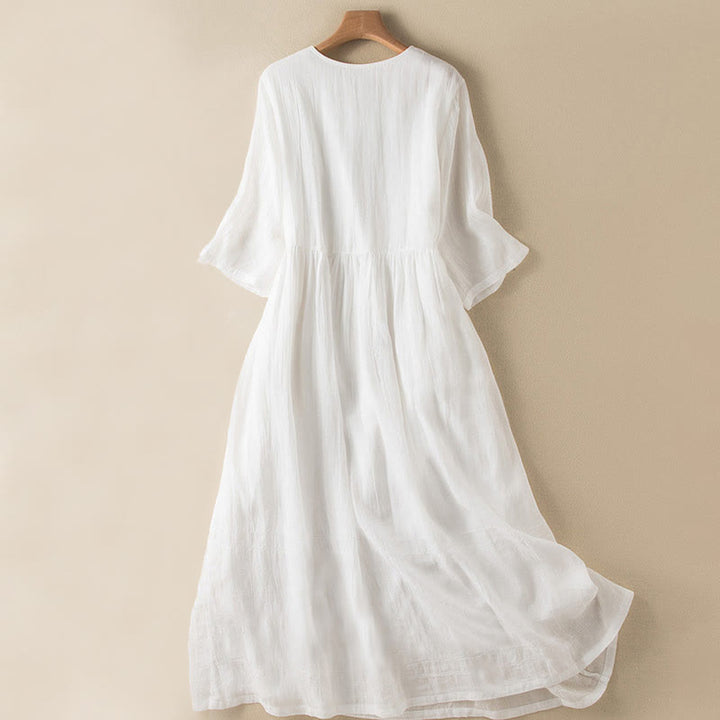 Letnia sukienka midi z bawełny z dekoltem w serek i krótkim rękawem "Buddha Stones" - image 23