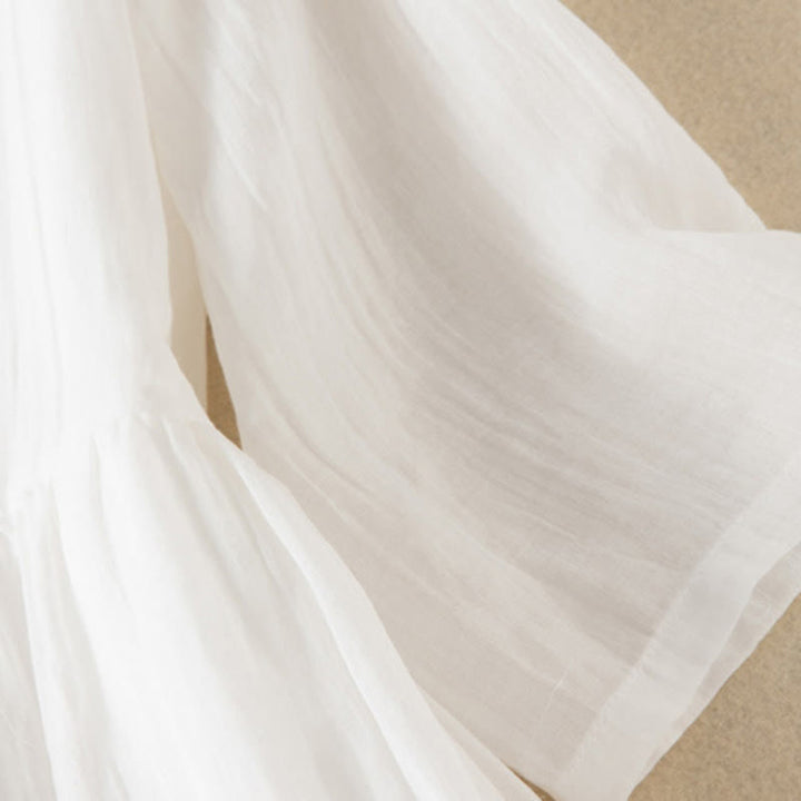 Letnia sukienka midi z bawełny z dekoltem w serek i krótkim rękawem "Buddha Stones" - image 24