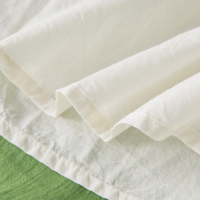 Letnia sukienka midi z bawełny z dekoltem w serek i krótkim rękawem "Buddha Stones" - image 37