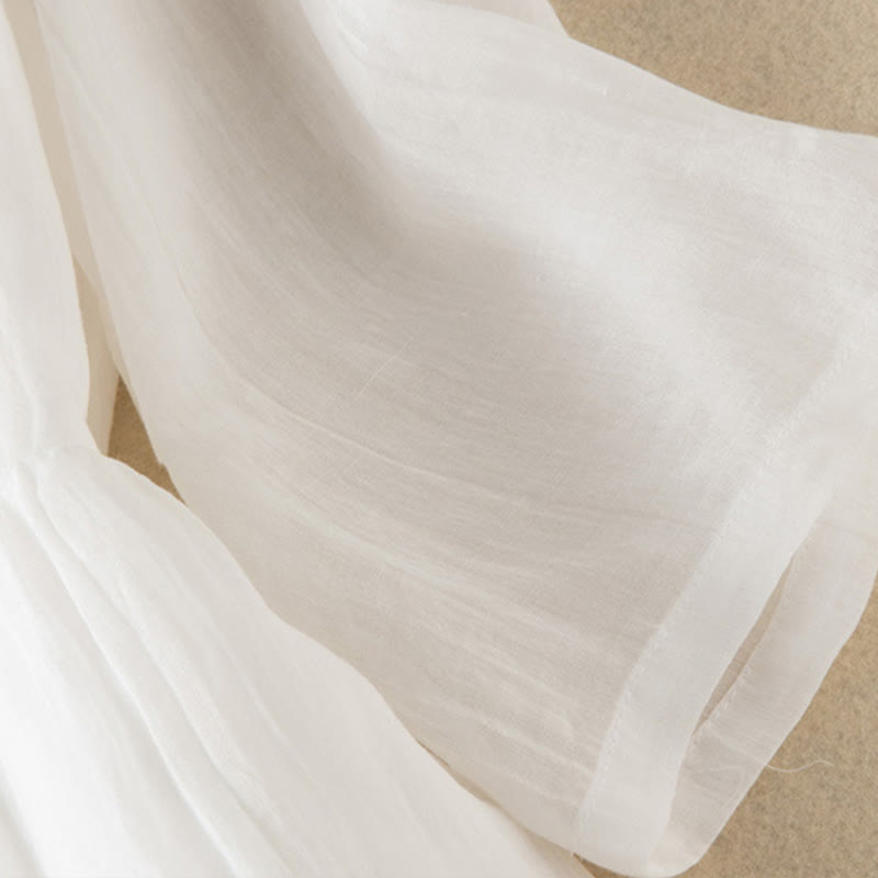 Letnia sukienka midi z bawełny z dekoltem w serek i krótkim rękawem "Buddha Stones" - image 34