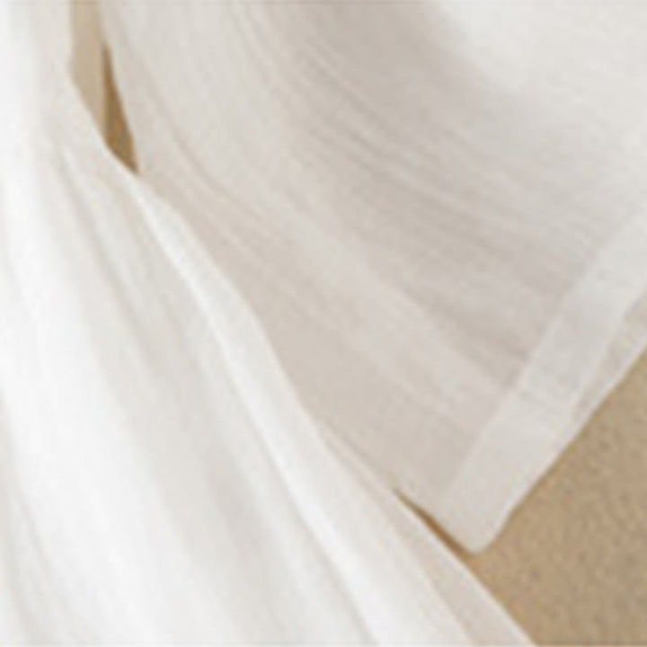 Letnia sukienka midi z bawełny z dekoltem w serek i krótkim rękawem "Buddha Stones" - image 20