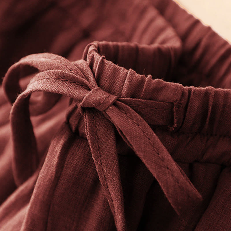 Spodnie damskie z szerokimi nogawkami i kieszeniami, w jednolitym kolorze, z podwójnym ściągaczem i Buddha Stones - image 1