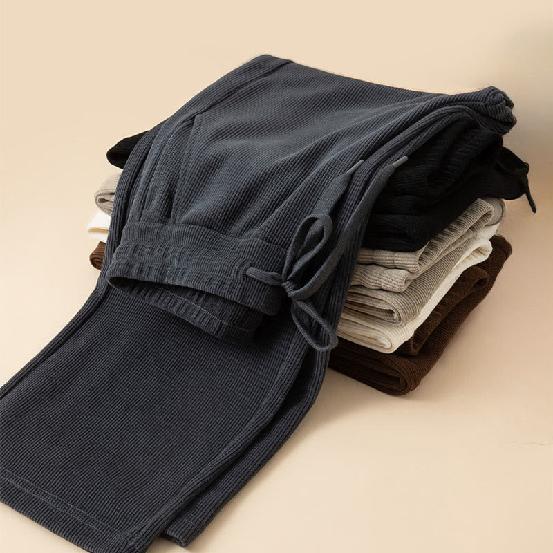 Damskie spodnie bawełniane z szerokimi nogawkami i kieszeniami w kolorze kamyków Buddha Stones - image 1