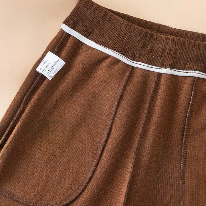 Damskie spodnie bawełniane z szerokimi nogawkami i kieszeniami w kolorze kamyków Buddha Stones - image 7