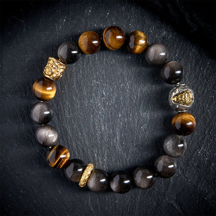 Bransoletka ochronna z naturalnego, srebrnego obsydianu z tygrysim okiem i trzema twarzami Buddha Stones - 20 cm - image 0