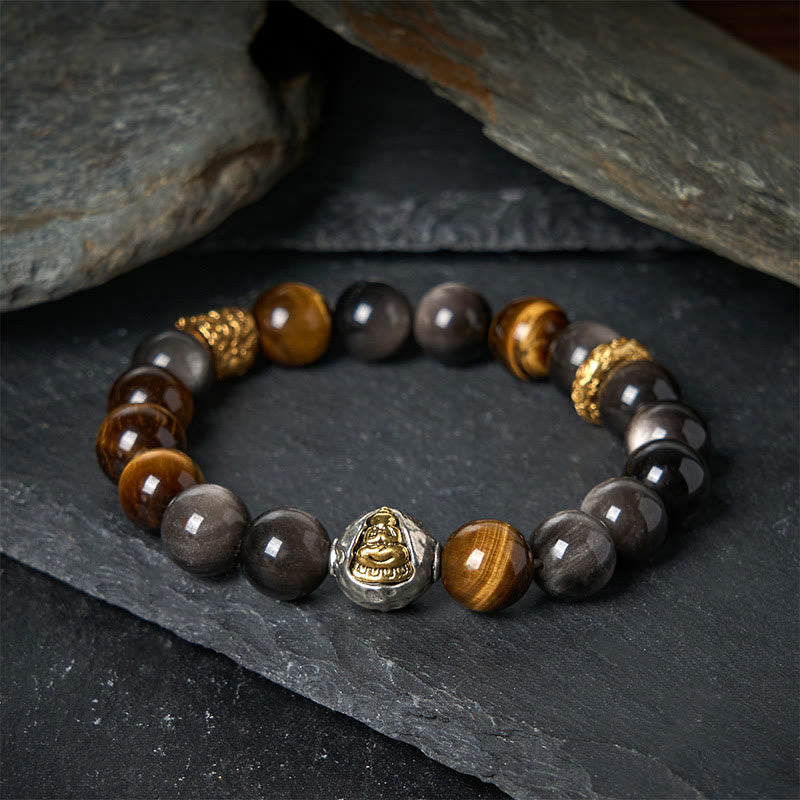 Bransoletka ochronna z naturalnego, srebrnego obsydianu z tygrysim okiem i trzema twarzami Buddha Stones - image 1