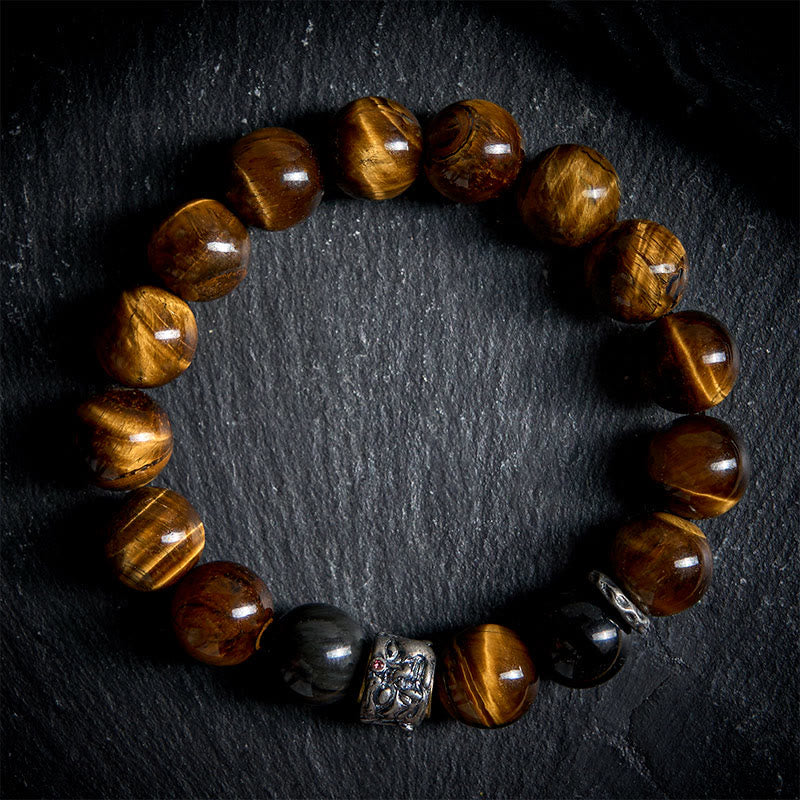 Bransoletka ochronna na głowę Buddy z Buddha Stones, tygrysim okiem i srebrnym połyskiem obsydianu - image 1