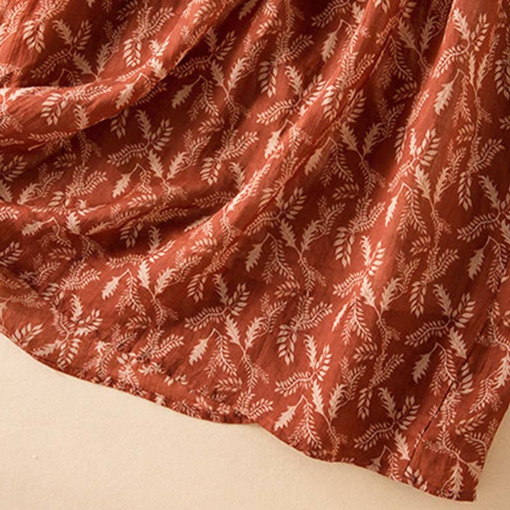 Sukienka midi z kontrastowym kwiatowym wzorem i półrękawem w kwiaty Buddha Stones z kieszeniami - image 24