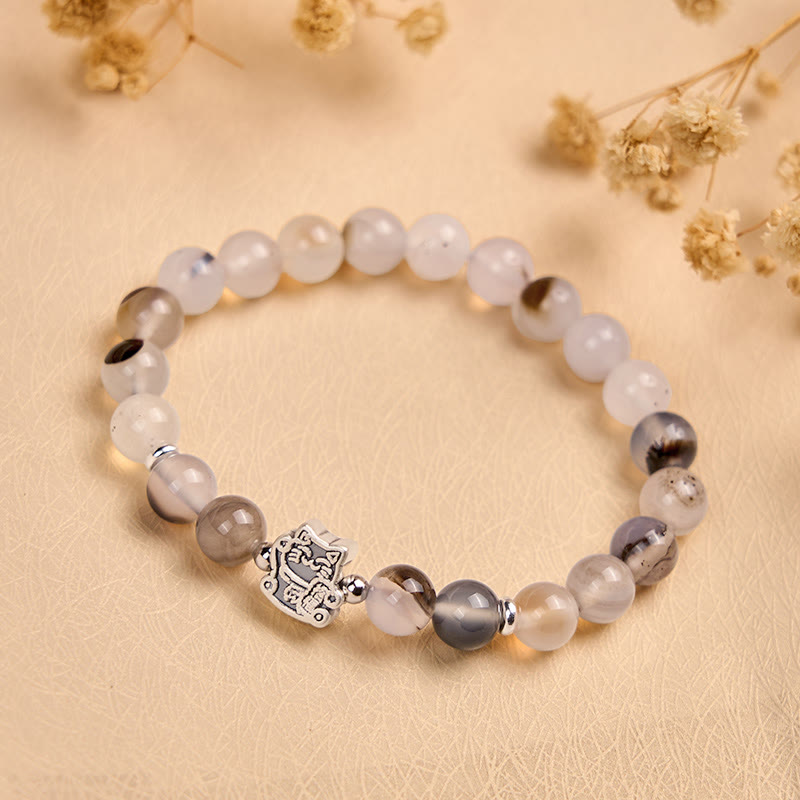 Bransoletka ochronna z Buddha Stones ze srebra próby 925 i naturalnym agatem w kolorze kaliko - image 1