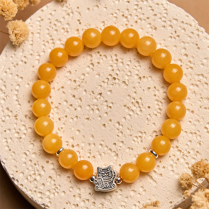 Bransoletka z Buddha Stones ze srebra próby 925 z pomarańczowym pręgowanym kotem i żółtym chalcedonem - image 3