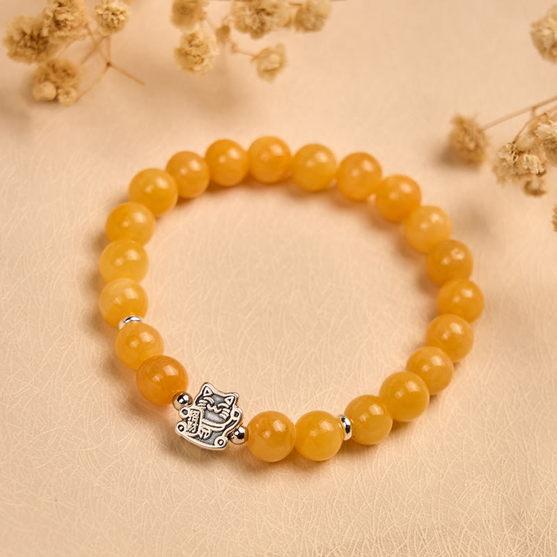 Bransoletka z Buddha Stones ze srebra próby 925 z pomarańczowym pręgowanym kotem i żółtym chalcedonem - image 1