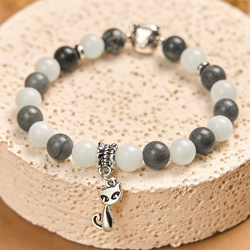 Bransoletka stabilizująca z naturalnego czarnego jaspisu z Buddha Stones w kolorze szarym i pręgowanym z białego chalcedonu - image 2