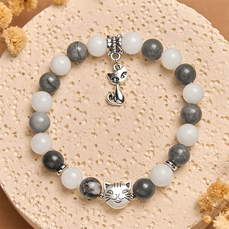 Bransoletka stabilizująca z naturalnego czarnego jaspisu z Buddha Stones w kolorze szarym i pręgowanym z białego chalcedonu - image 3
