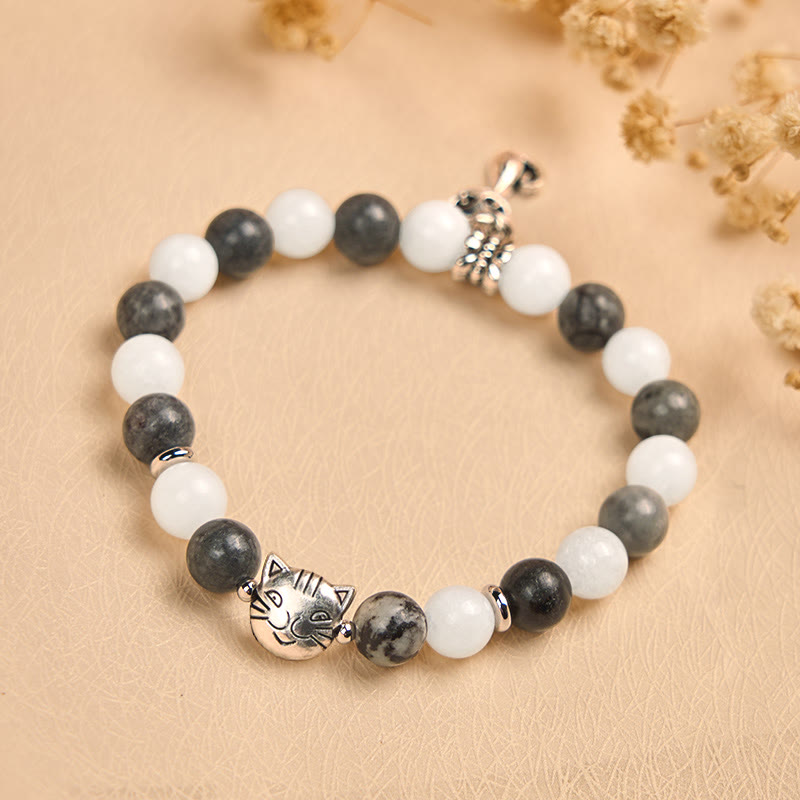 Bransoletka stabilizująca z naturalnego czarnego jaspisu z Buddha Stones w kolorze szarym i pręgowanym z białego chalcedonu - image 1