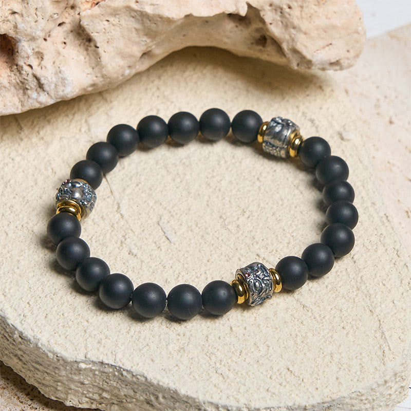 Bransoletka ochronna na twarz Buddy z Buddha Stones Buddy z naturalnego matowego czarnego onyksu - image 1